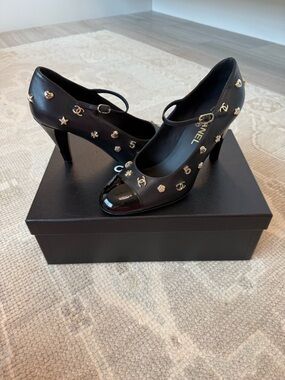NEW CHANEL Black Leather Mary Jane Pumps with Gold Logos